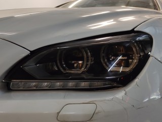 BMW 6 замена стекла фары и тонирование полиуретановой плёнкой (4)