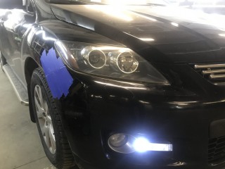 Mazda CX-7 ремонт запотевания фар (2)