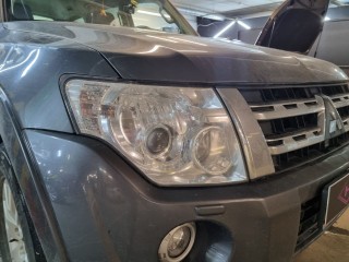 Mitsubishi Pajero замена линз на Aozoom K3,  шлифовка и бронирование фар (1)