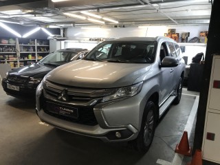 Mitsubishi Pajero Sport замена линз на Bi-led Aozoom A12 (2)